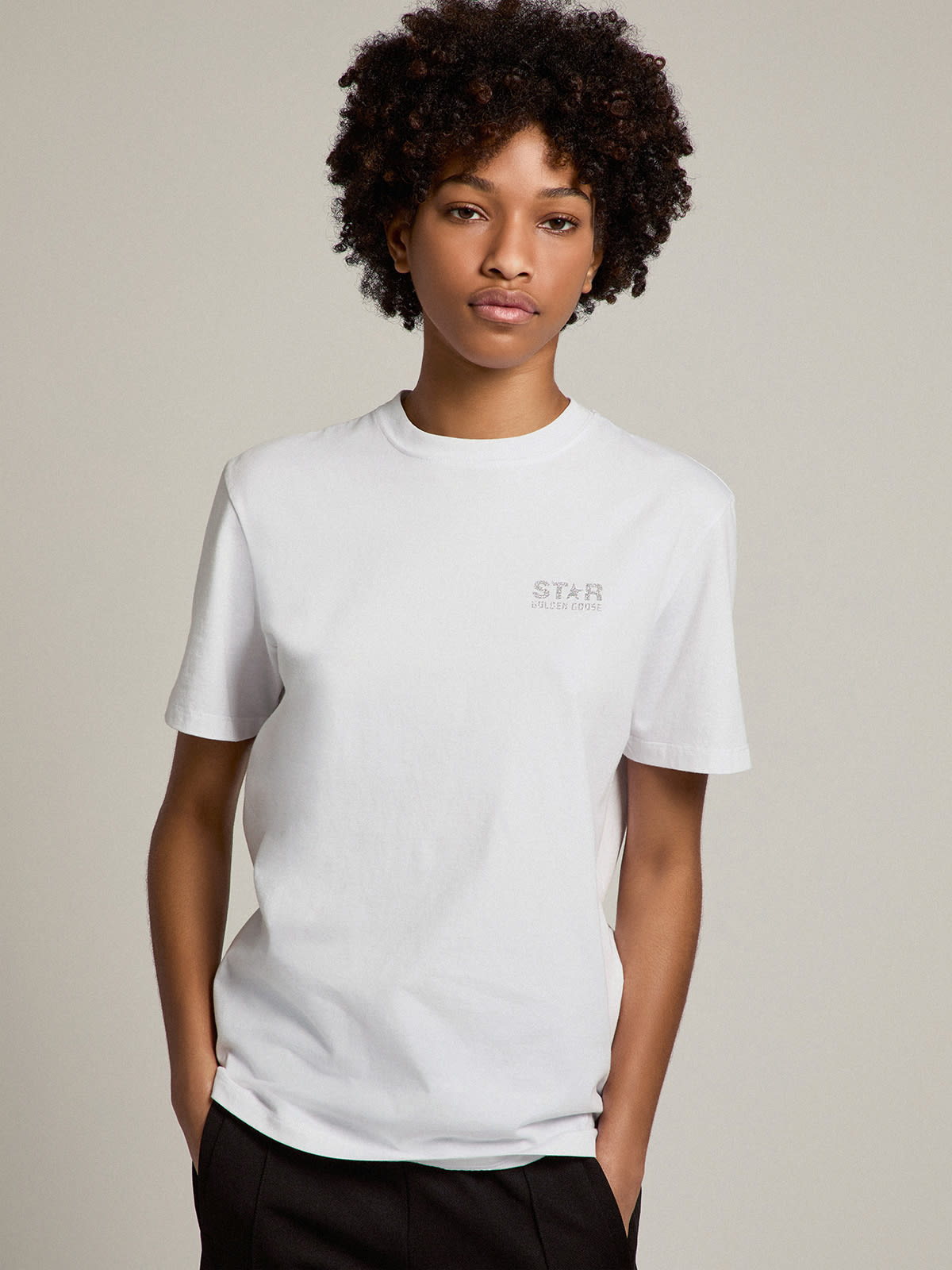 Women's white T-shirt with silver glitter logo and star