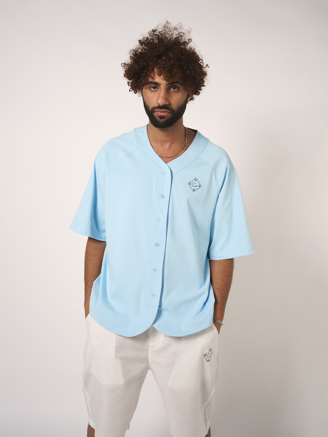 POWDER BLUE JERSEY SHIRT WITH HOUSE OF CENMAR PATCH