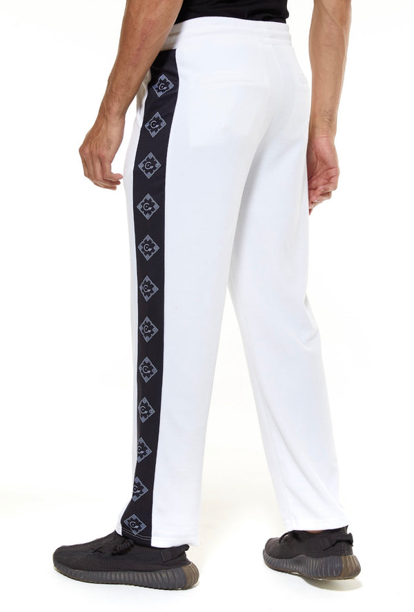 WHITE VELVET PANTS WITH WOLF PATCH ON TH