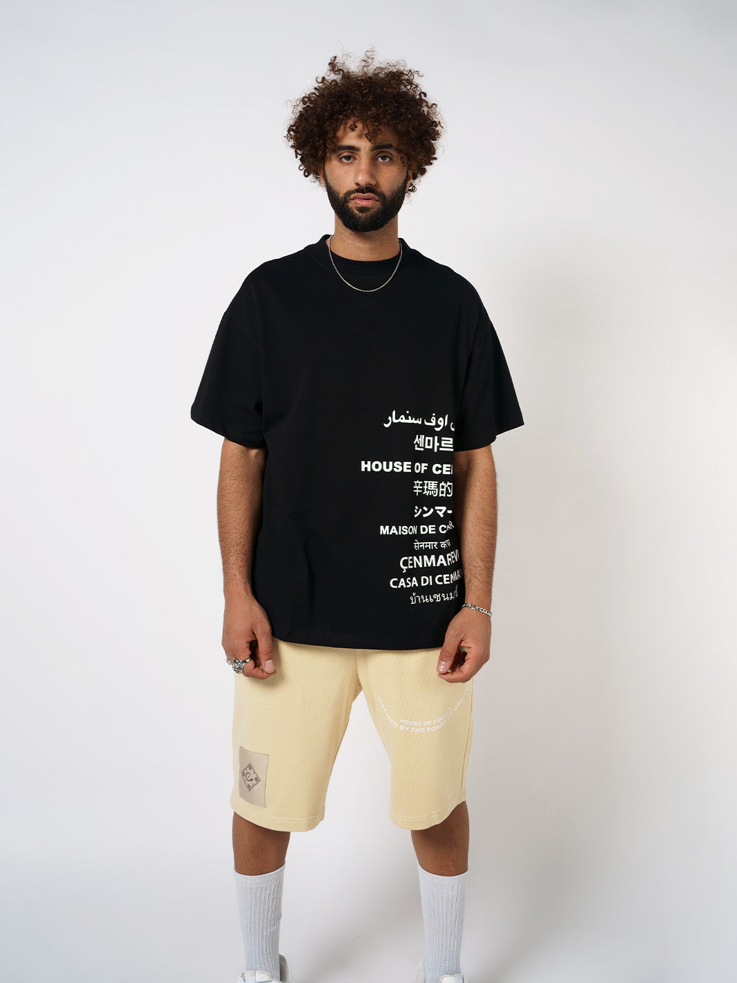 BLACK T-SHIRT WITH ” HOUSE OF CENMAR” IN MULTI-LANGUAGES